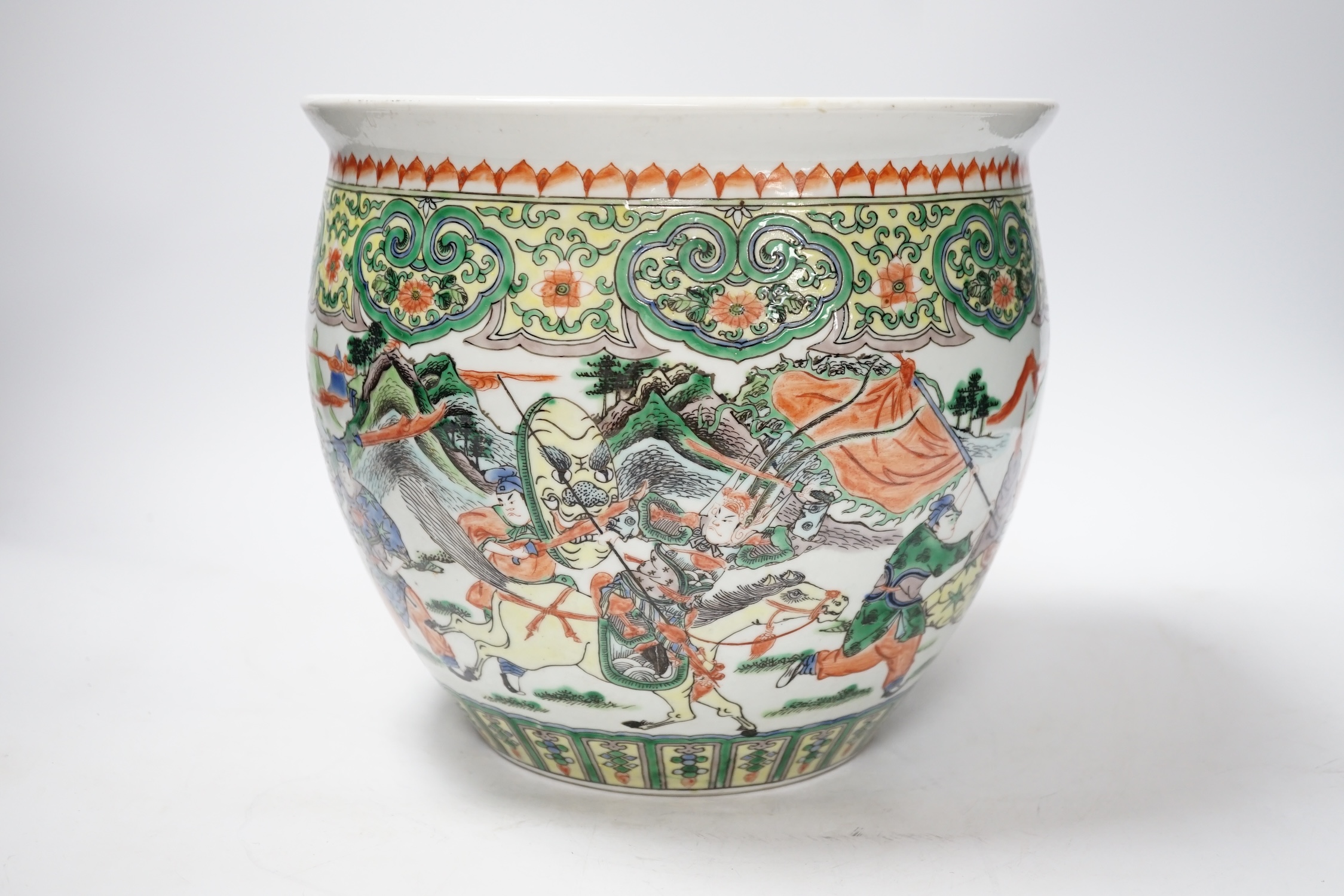 A 19th century Chinese famille verte ‘warriors’ jardiniere, 22.5cm high